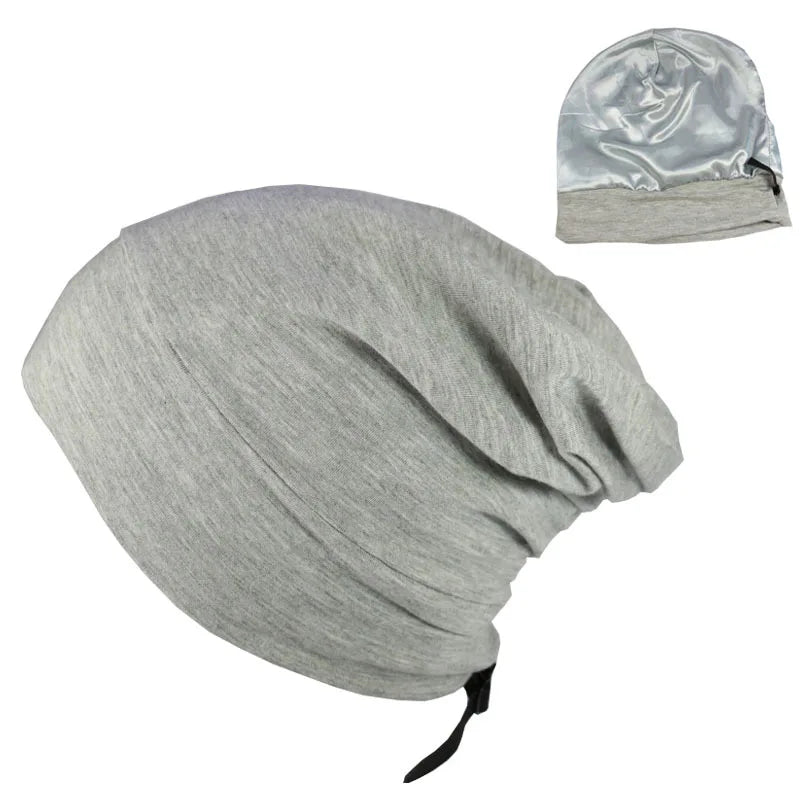 Soft grey bamboo cotton beanie with satin lining – breathable unisex night cap for frizz control.