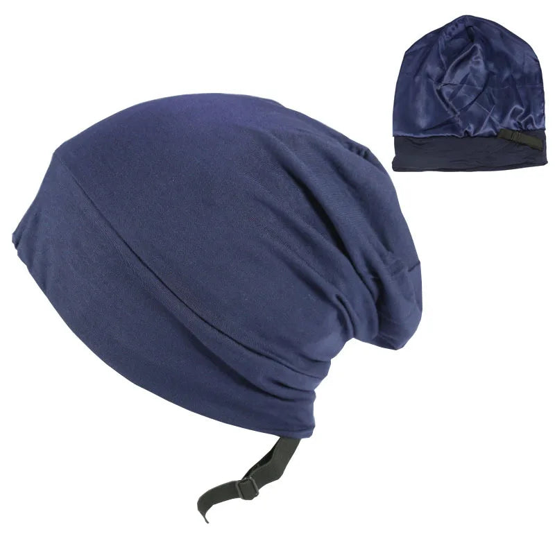 Unisex navy blue satin lined bamboo beanie for hair protection and comfortable sleep.