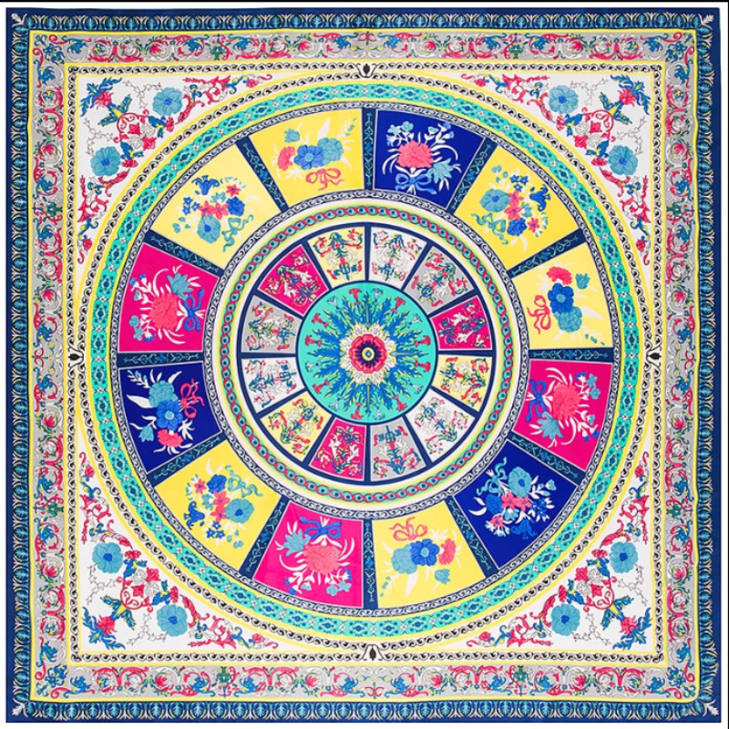 Magenta and turquoise luxury silk scarf with ornate circular motif.