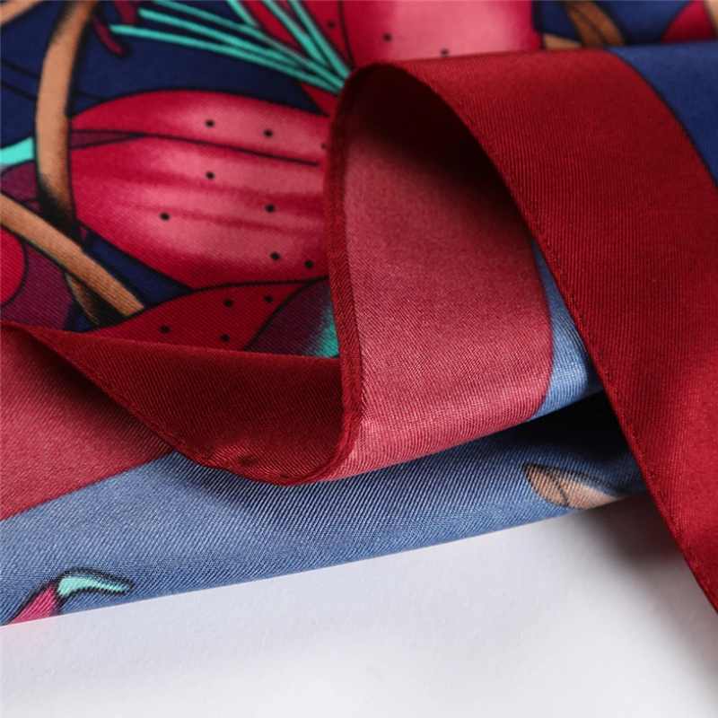 Close-up of burgundy border and twill silk texture – Floral Grace Midnight Blue scarf by Silkvana